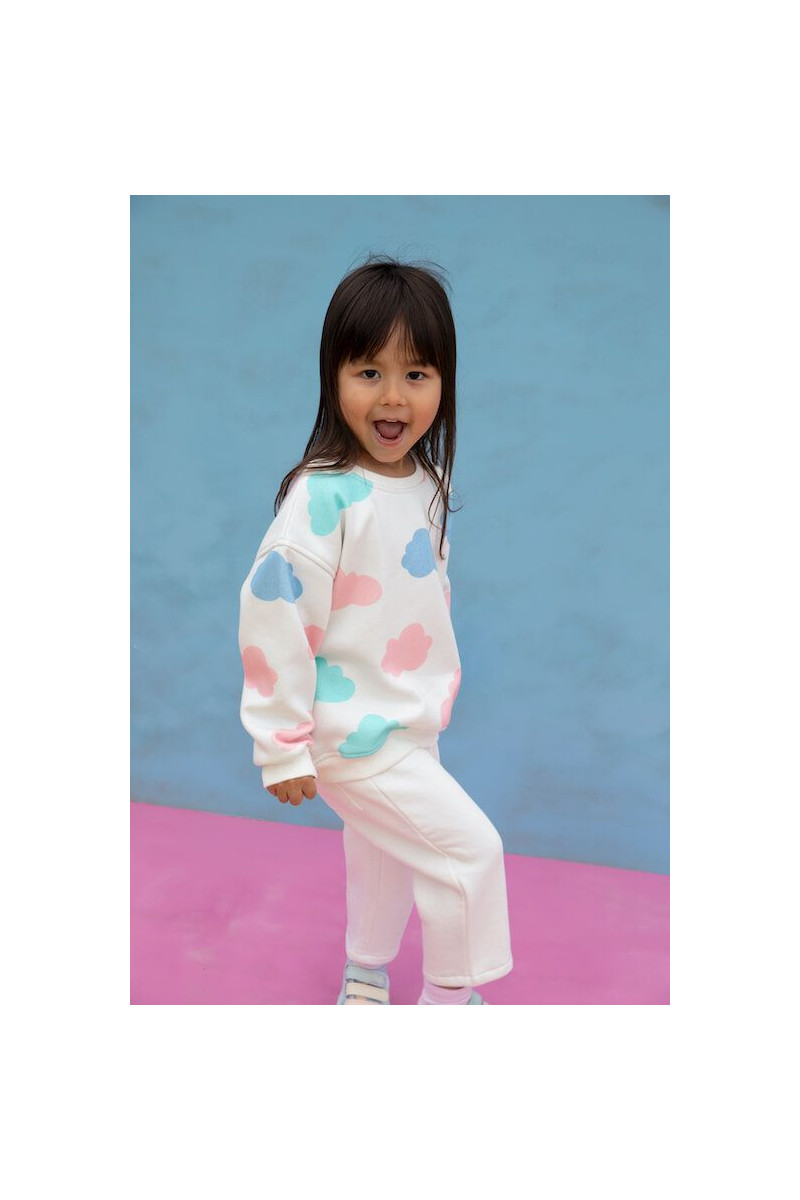 Ensemble molletonné pour enfants. Sweat oversize et jogging coupe ballon. Motif nuage coloré et graphique