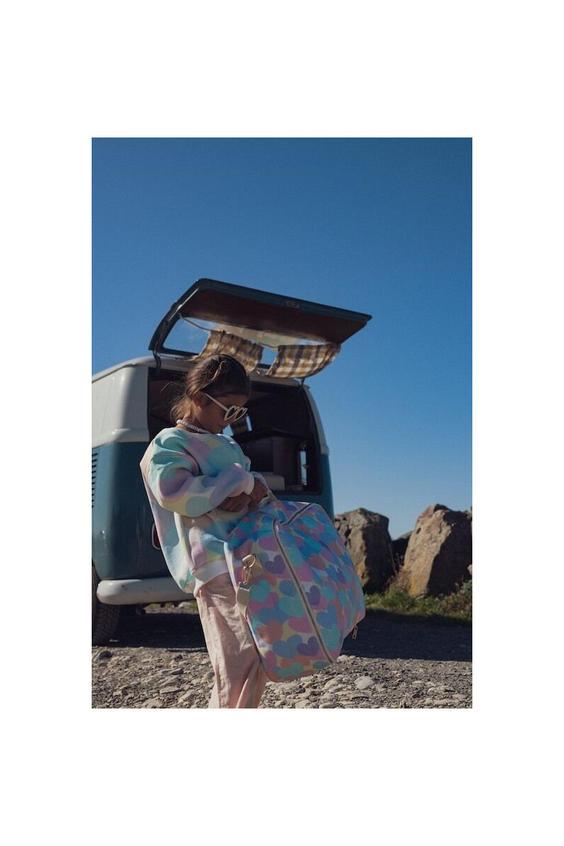 Valise pratique au motif arty coeur pastel